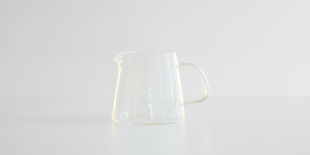Side view of a small glass server.