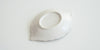 The bottom of a leaf trivet, white with a matte finish.