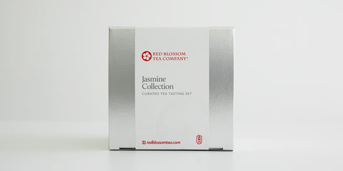 A silver box with a white label reading “Jasmine Collection”