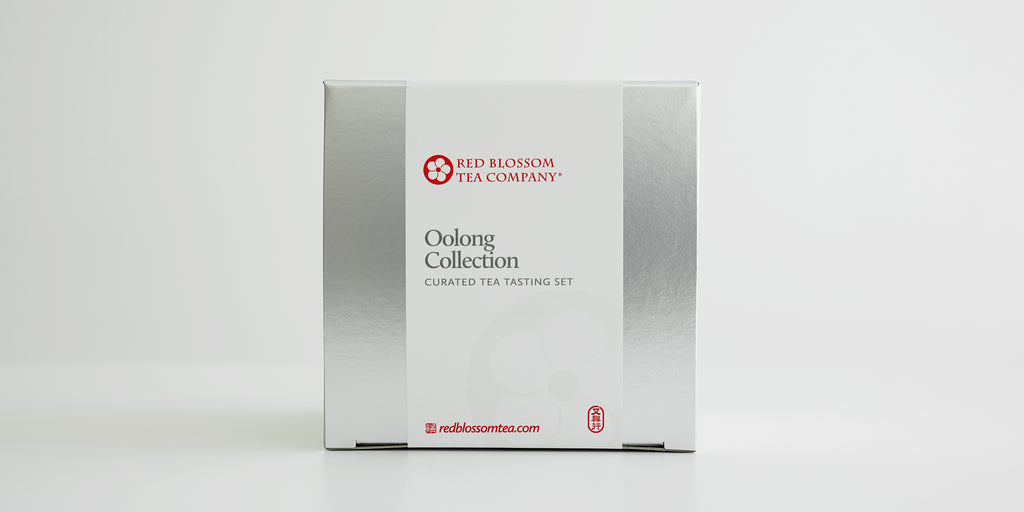 A silver box with a white label reading “Oolong Collection”