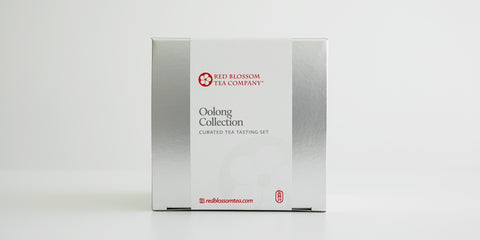 A silver box with a white label reading “Oolong Collection”